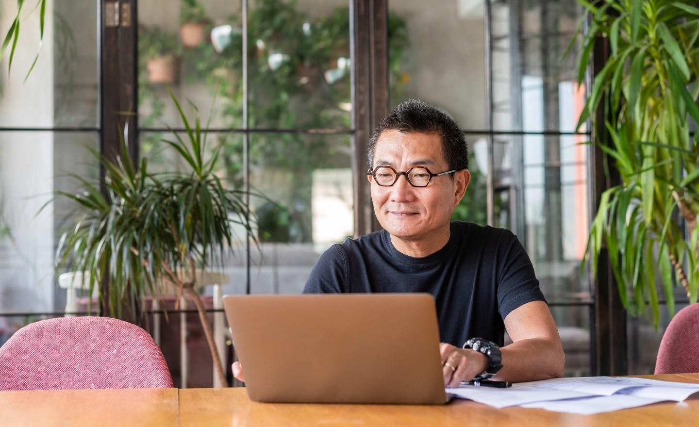 Business man working on laptop in home office