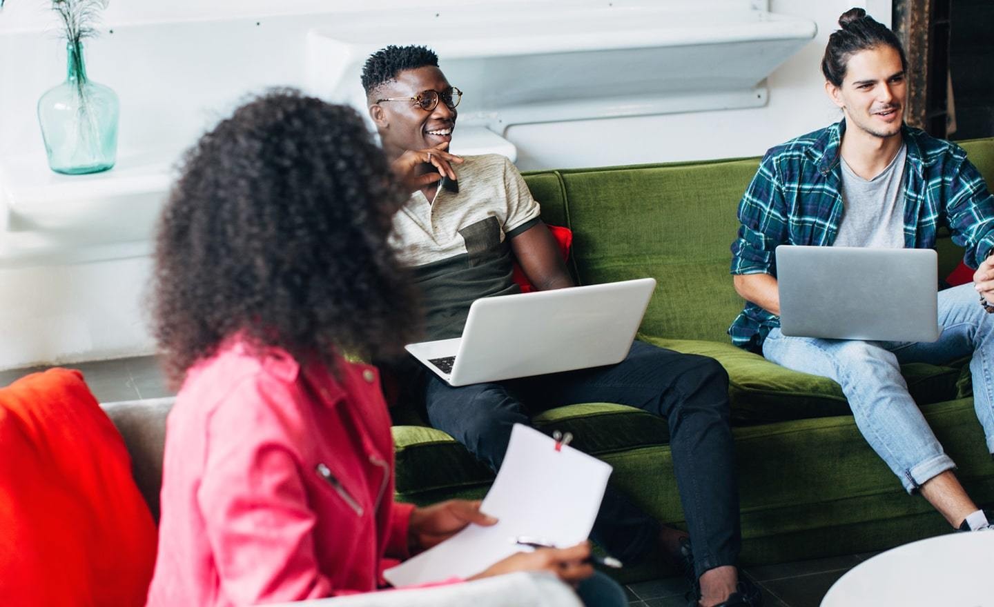 Group of people meeting on couches