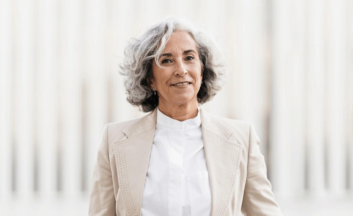 Headshot of women with grey hair