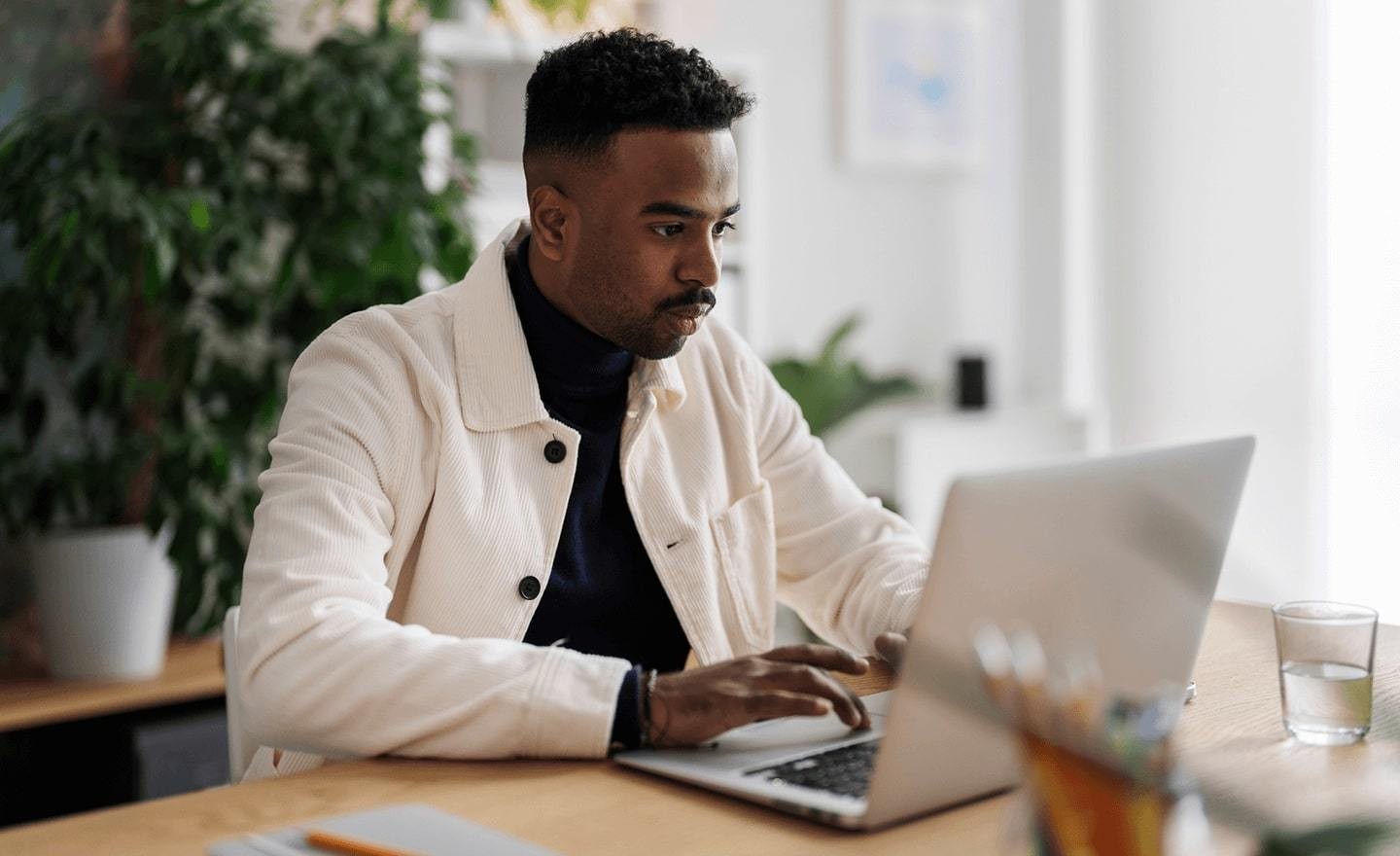 Man at desk with laptop