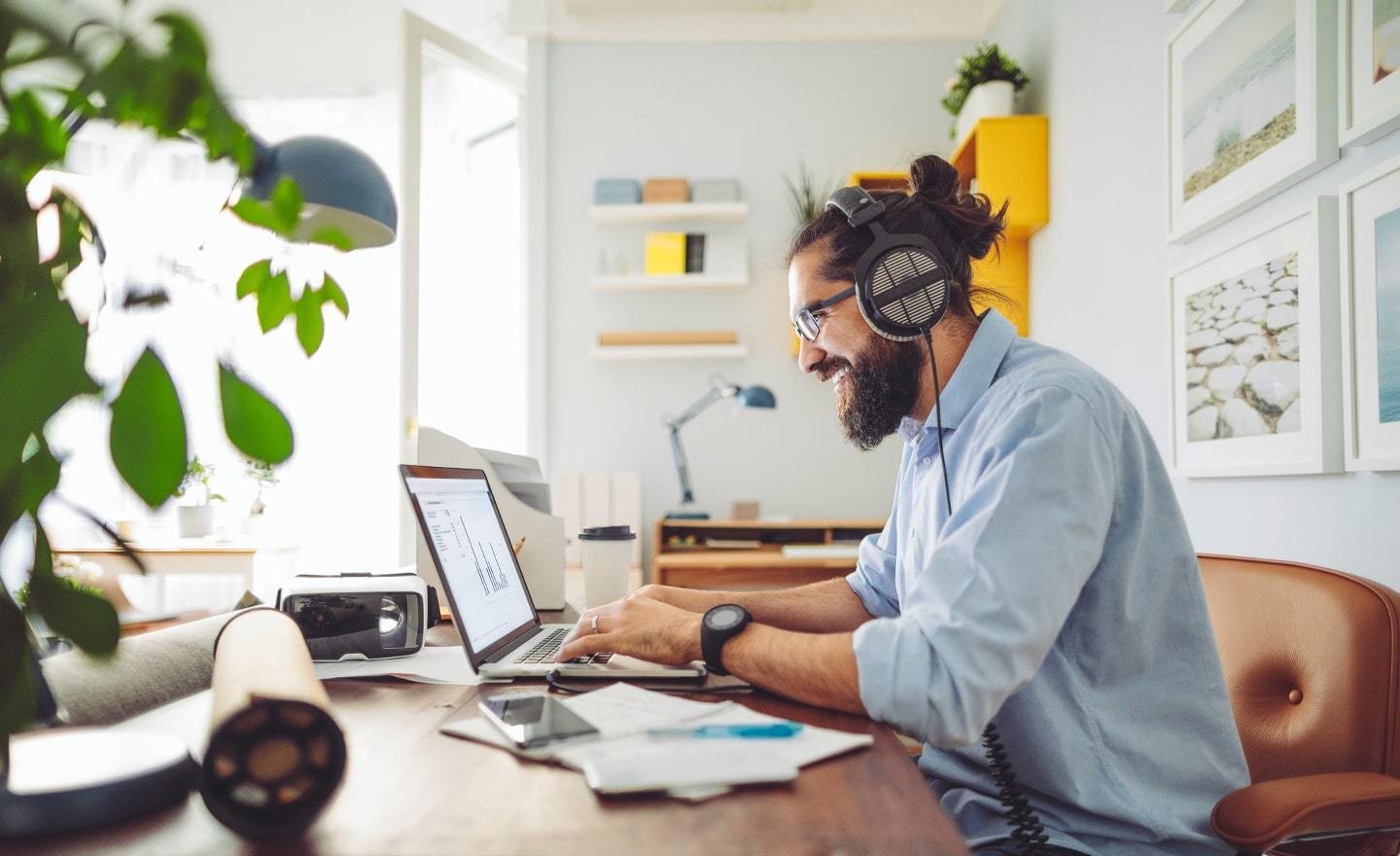 Man using laptop to search for jobs