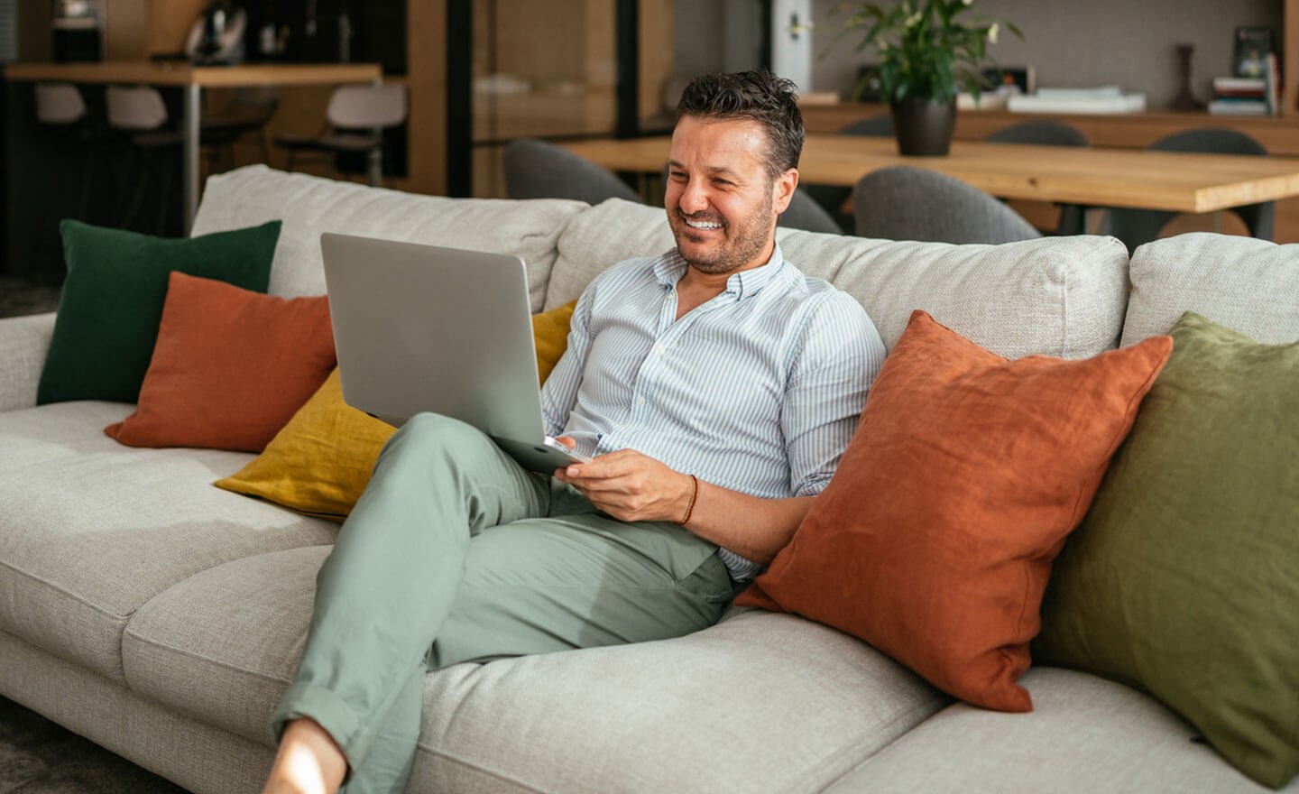 Man working on laptop at home