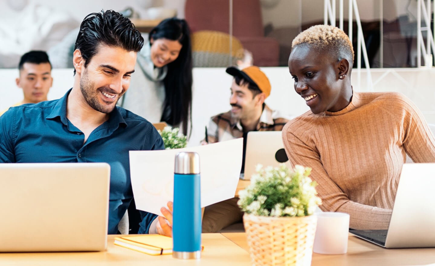 Photo of people working in an open office