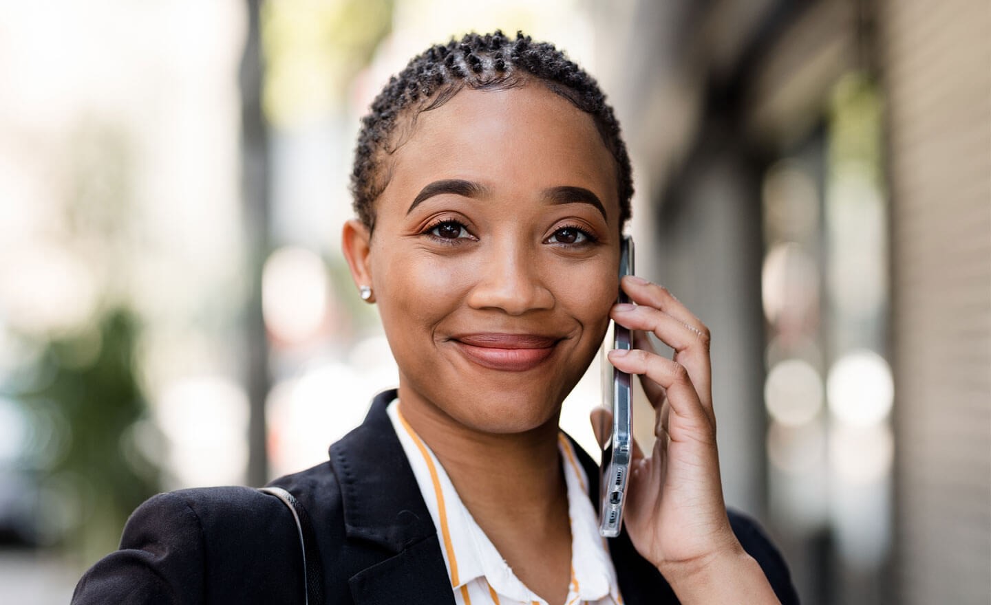 Portrait of a happy confident woman on the phone 1