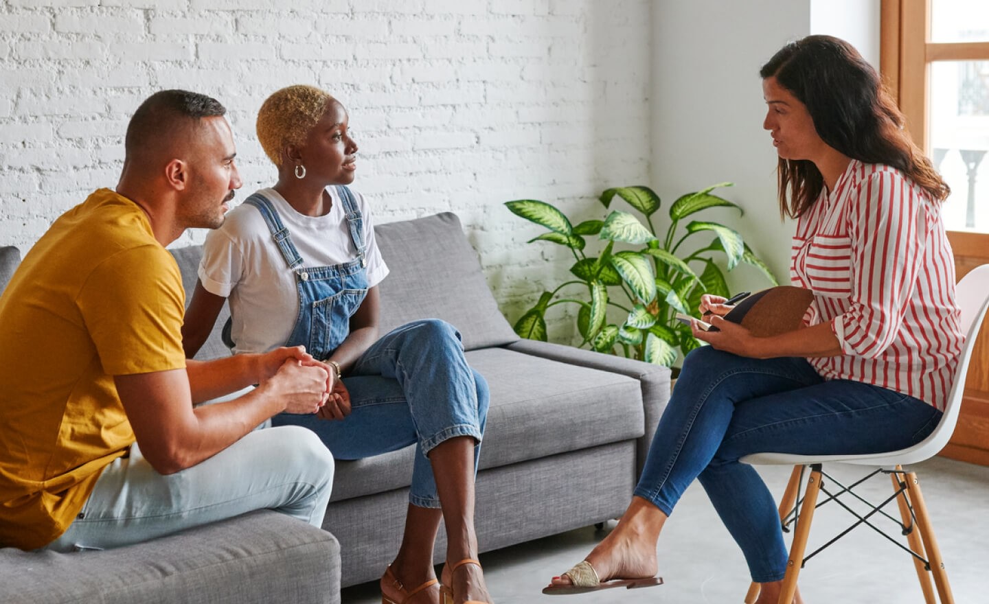 Three coworkers in a lounge