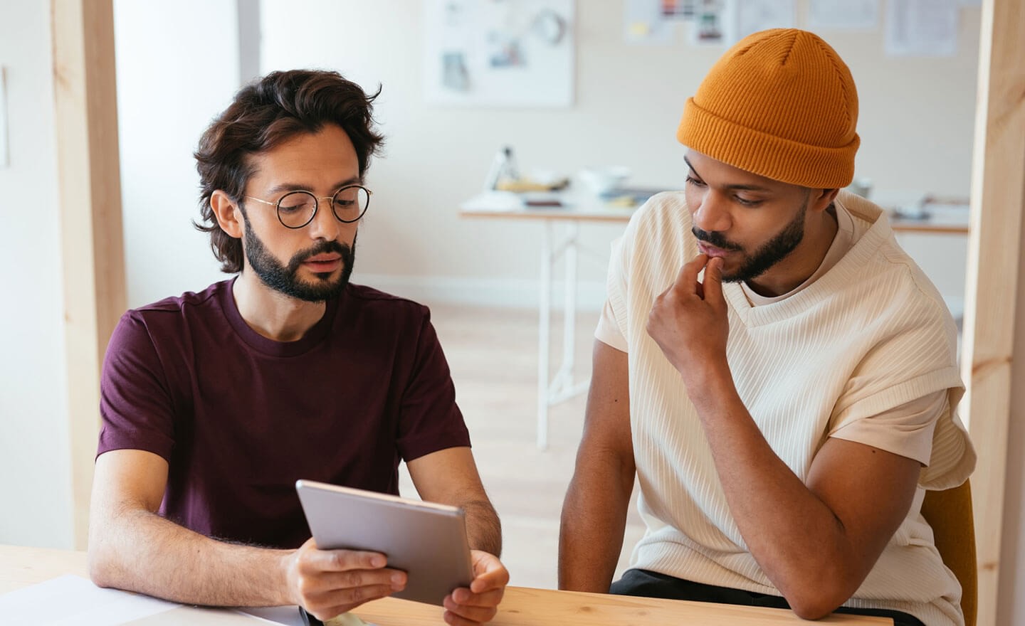 Two coworkers looking at hiring data