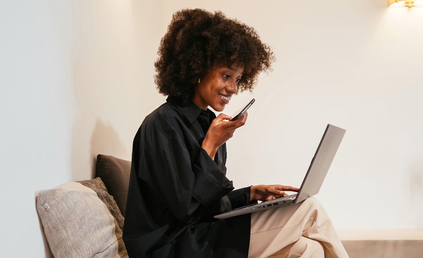 Woman using dictation on phone interview 1