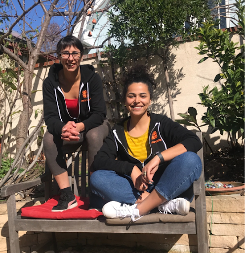 two female engineers siting on a bench